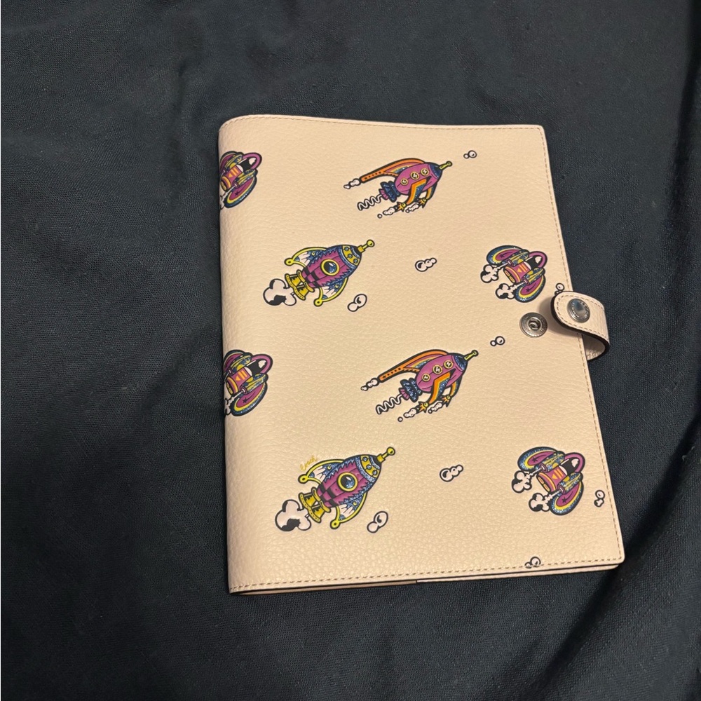 Coach new Cream Notebook with Colorful Rocket Design with notebook